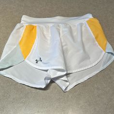 New Without Tags Never Worn Smoke Free House Under Armour White Bottoms For Summer, Under Armour Short Bottoms For Spring, Yellow Athletic Shorts For Spring, Yellow Sporty Shorts For Spring, Under Armour Workout Shorts For Summer, Under Armour Athletic Shorts For Summer, Yellow Sports Shorts For Spring, Casual White Under Armour Shorts, Under Armour White Casual Shorts