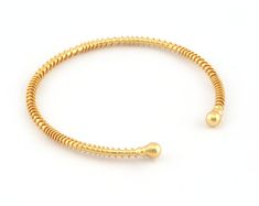 Shape: Wire bracelet Material : Brass Size: 58mm Size Finish: Shiny gold plated Color : Shiny gold Would you like to see our other products like this? https://www.etsy.com/shop/OzBrassShop? search_query=bracelet The decision to buy a bracelet, like any piece of jewelry or accessory, depends on a combination of personal preferences, needs, and considerations. Here are some common reasons why people choose to buy bracelets: 1. **Fashion and Style Many people purchase bracelets to enhance their personal style and fashion. Bracelets can be an essential accessory that complements an outfit, adds a pop of color, or completes a look. Some bracelets are chosen for their aesthetic appeal and ability to make a fashion statement. 2. **Sentimental Value Bracelets are often chosen for their sentimental Elegant Gold Spiral Bangle, Gold Spiral Bracelet As Gift, Gold Spiral Bracelet For Gift, Adjustable Gold Spiral Bangle, Adjustable Spiral Gold Bangle, Twisted Bracelet, Special Jewelry, Wire Bracelet, Fashion And Style