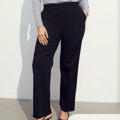 Dress Pants In Black. Regular Waist, Zip Fly With Concealed Button And Hook-And-Eye Fastening, Diagonal Side Pockets, And No Back Pockets. Straight Legs With Creases At Front And Back. Size: 20 Length: Long Waist Rise: Regular Waist Fit: Regular Fit Style: Straight Leg, Suit Pants Description: Black, Solid-Color Approx 20” Across Waistband, 30” Inseam, 14” Rise. Polyester Blend Wide Leg Pantsuit With Button Closure For Work, Semi-formal High Waist Black Dress Pants, Tailored Black Bottoms With Button Closure, Chic Business Pants With Button Closure, Tailored Dress Pants With Button Closure For Work, Tailored Black Pants With Button Closure, Black Dress Pants With Button Closure For Formal Occasions, Black Formal Dress Pants With Button Closure, Formal Black Dress Pants With Button Closure