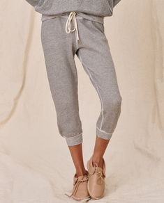 This worn in sweatpant is the perfected version of a vintage gym pant. Its drawstring waistband and ribbed cuffs make for a relaxed look. 100% Cotton Machine Wash Cold Tumble Dry Low Made in the U.S.A. Sporty Sweats With Drawstring For Loungewear, Sporty Drawstring Sweats For Loungewear, Sportswear Loungewear Bottoms With Drawstring, Sportswear Lounge Bottoms With Drawstring, Sporty Joggers With Elastic Cuffs For Lounging, Drawstring Bottoms For Loungewear Sportswear, Drawstring Sportswear Bottoms For Loungewear, Drawstring Bottoms For Loungewear, Sporty Joggers For Lounging In Spring