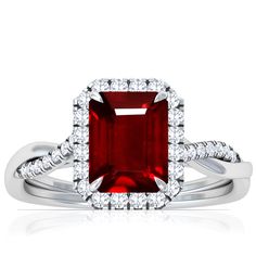 This 18k Yellow Gold hand-crafted halo ring comes with a 1.75ct ruby emerald cut prong set. There are also 34 diamonds with total weight of 0.36cts. This ring is backed by GemsNY's 30-day return policy and life time warranty. Eligible for financing. All rubies at GemsNY are 100% natural. Make Your Own Ring, Ruby Emerald, Twisted Band, Gold Hand, Gold Hands, Life Time, Halo Ring, Ruby Ring, Halo Rings