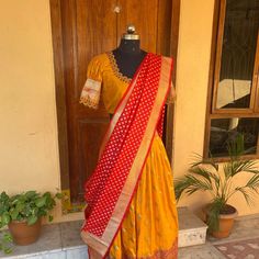 Wedding lehenga choli/ lehenga set with dupatta / teens lehenga/ bridal lehenga/ kids lehenga Indian banarasi half saree / crop top lehenga/ lehenga USA / Langa voni / voggish / yellow red lehenga / pattu pavadai Here is a beautiful and traditional Indian banarasi katan silk lehenga in mustard yellow color with red color border combination is a stunning piece for your upcoming parties!! It's a 3 piece set that includes skirt , hand embroidered blouse and red banarasi dupatta, please find the det Traditional Gown With Unstitched Blouse For Festive, Choli With Pallu For Festivals In Traditional Drape, Designer Saree Choli With Pallu, Festival Choli With Pallu And Traditional Drape, Traditional Drape Banarasi Silk Choli For Navratri, Banarasi Silk Choli For Navratri With Traditional Drape, Anarkali Choli With Traditional Drape And Pallu, Traditional Anarkali Choli With Pallu, Traditional Drape Choli With Pallu For Diwali