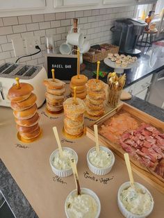 an assortment of food is displayed on a counter