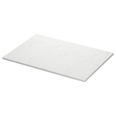 a white marble cutting board on a white background