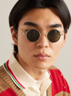 Gucci Eyewear's sunglasses are inspired by panthos styles from the '50s and '60s. They're made from gold-tone metal with small, round frames and have slender arms. Slender Arms, Round Eyewear, Gucci Eyewear, Round Frames, Sunglasses For Men, Gold Sunglasses, Round Frame, Luxury Gifts, Mr Porter