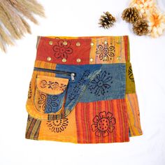 Hippie Skirt, Short Patch Mini Skirt, Vintage Wrap Cotton Skirt with Side Pockets, Plus Size , Boho Handmade Summer Skirt, Popper Button Add a touch of vintage charm to your wardrobe with our Hippie Skirt. This handmade cotton skirt features a patchwork design and adjustable waist with popper buttons, making it both stylish and comfortable to wear. Short Patch Mini Skirt Side Pockets for convenience Boho, Retro Style for festival fashion or everyday wear Suitable for All Seasons with Mid Waist Height and Button Closure Type. The wrap style of this skirt adds a chic element that's perfect for casual occasions. Its mini length is versatile and can be paired with flats or heels depending on the occasion. Plus size options are available to ensure that every woman can rock this look. Elevate yo Cotton Mini Skirt With Buttons, Bohemian Mini Cotton Skirt, Bohemian Cotton Mini Skirt, Bohemian Mini Skirt In Cotton, Cotton Mini Skirt With Button Closure, Hippie Cotton Mini Skirt For Festivals, Cotton Hippie Mini Skirt, Hippie Cotton Mini Skirt, Hippie Style Cotton Mini Skirt