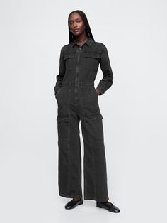 Authentic, no-stretch denim jumpsuit.  Point collar, button front.  Long sleeves.  Patch pockets at chest.  Elasticized waist.  Front slant pocket, back patch pockets.  Cargo pockets at sides.  Responsibly Made: This denim jumpsuit is made with 5% recycled cotton and is part of our water-saving Washwell program.  Compared with conventional wash methods, Washwell uses at least 20% less water and has saved over a billion liters of water since 2016.  Fit: Slim.  A fitted silhouette that fits close to the body.  Full-length, wide leg.  Models wearing Gap Lifestyle Modeling, Cargo Jumpsuit, Arm Exercises, Black Dress Trousers, Denim Cargo, Water Saving, Formal Shirts For Men, Gap Denim, Newborn Dresses