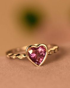 "7mm heart shaped Cut Lab treated Color-change Alexandrite ring in 925 sterling silver. White/yellow/rose gold plated. The stones of the ring can be replace with other different kinds of gemstone such as morganite, aquamarine, amethyst, citrine, white CZ, pink CZ,etc. If there isn't the gemstone that you want in the \"Gemstone\" option, please feel free to contact with me. ♥ PS: When you order the ring , the default color of gold plated is what it show in the photo. If you want the other color o Heart Shaped Stone Ring, 14k Gold Heart Cut Jewelry With Center Stone, 14k Gold Heart-shaped Proposal Jewelry, Rose Gold Heart Solitaire Jewelry, Heart-shaped Rose Gold Solitaire Jewelry, Rose Gold Solitaire Ring For Valentine's Day, Heart Shaped Rose Gold Solitaire Jewelry, Rose Gold Sterling Silver Heart Ring With Charm, Rose Gold Heart Cut Cubic Zirconia Heart Ring