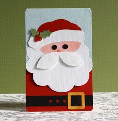 a christmas card with santa clause on it