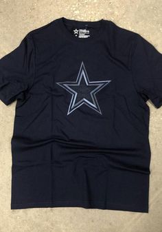 Dallas Cowboys Navy Blue Roland Short Sleeve T Shirt - 41029054 Blue Crew Neck T-shirt For Sports Season, Navy Cotton T-shirt For Sports Season, Blue Team Spirit T-shirt For Game Day, Casual Blue T-shirt For Football Season, Navy Casual T-shirt For Sports Events, Blue T-shirt With Football Season Screen Print, Blue Sports Fan Tops For Football Season, Blue T-shirt For Football Season Sports, Blue Sports Fan Top For Football Season