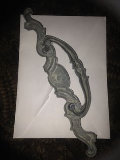 an envelope with a decorative handle on it