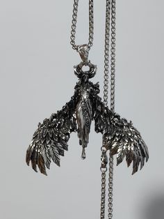 gorgeous beautiful large Vintage necklace / Gothic necklace/Mythological goddess, Wings angel, retro punk trendy street , cool , antique silver charm large Pendant Necklace for men suitable for women, gift for men or women. 7*6,5cm pendant size  60cm necklace length     The necklace will be sent in a organza gift pouch.      We ship through REGISTERED MAIL with a tracking number.      Before making purchase please check out again your shipping address. Buyer is fully responsible if incorrect and Goth Necklace Men, Seraphim Necklace, Goddess Wings, Winged Angel, Punk Necklace, Goth Necklace, Angel Charm, Large Pendant Necklace, Necklace Gothic