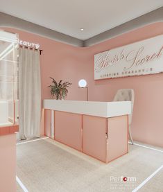 a pink and white reception area with a sign on the wall