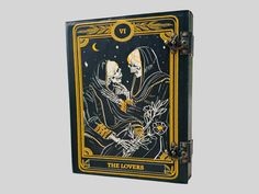 the lovers tarot box with skeleton playing cards on it's front and sides