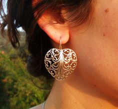 Sterling Silver Filigree Earrings, Heart Shape with a gentle Lace design. This pair of earrings is gentle as lace and outstanding as our hearts. WIll make the perfect gift for your beloved ones and thy self. Comes in a gift jewel box - ready to give away! Length: 4.2 cm (from the top of the wire) Max Width: 3.3 cm. Please let me know if you have any questions. our jewelry shop on Etsy: http://www.etsy.com/shop/Porans Thanks for visiting! Please visit my shop policies for additional information Filigree Heart, Heart Earring, Romantic Heart, Romantic Jewelry, Freshwater Pearl Ring, Romantic Jewellery, Earrings Heart, Filigree Earrings, Earring For Women