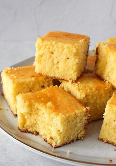 several pieces of cake sitting on top of a plate