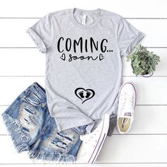 "This coming soon pregnancy announcement shirt is for one bella canvas unisex T-shirt. This shirt is the perfect shirt for your baby announcement or pregnancy reveal. It's also the perfect new mom gift, baby shower gift or maternity gift. + This shirt is a unisex shirt, not a maternity shirt. Unisex shirts have a \"boyfriend fit\" which works well for pregnant women in their first and second trimesters. Order your normal size for a casual looser fit, size down if you would like a slimmer fit. Al Baby Reveal Ideas, Unisex Shirt Design, Fur Mama Shirt, Baby Announcement Shirts, Dog Mama Shirt, Pregnancy Announcement Shirt, Mom To Be, Pregnancy Reveal, Dog Mom Shirt