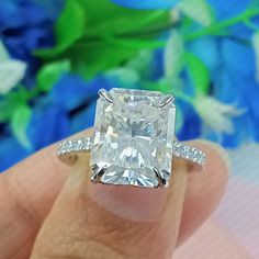 ❤️❤️❤️❤️❤️❤️❤️❤️❤️❤️❤️❤️ Item Information ◆ Brand: Inspired Creation for Love  ◆ Ring Size: 4 to 12 USA All Size available  ◆ Main Stone: 11x9mm Radiant Cut Moissanite ◆ Secondary Stone: Round Cut Moissanite ◆ Stone Color: White ◆ Stone Color: DEF ◆ Stone Clarity: VVS1 ◆ Cut: Excellent ◆ Style: Hidden Halo ◆ Stone Carat Weight (TCW): 5.26ct ◆ Metal Weight: 4.5 Gram Approx ◆ Hallmark: 925/10/14K/950PT Stamped ◆ Certification: On Request ◆ Condition: Brand New, Never been Used ◆Center Stone 0.75 to 8.00ct Moissanite Stone can be personalized on request.  ◆Free Insured Trackable Shipping. We also accept bulk orders at wholesale prices. ❤️❤️❤️❤️❤️❤️❤️❤️❤️❤️❤️❤️ MOISSANITE  vs  DIAMOND * Moissanites maintain their clarity & sparkle throughout a lifetime just like a Diamond * Moissanites are act Big Diamond Ring, Big Diamond Rings, Radiant Cut Engagement Ring, Hidden Halo Ring, Moissanite Vs Diamond, Engagement Ring Moissanite, Radiant Cut Engagement Rings, Big Diamond, Moissanite Wedding Rings