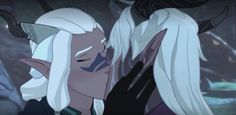 an animated image of two people kissing each other with horns on their heads and white hair