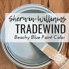 there is a paint can with a brush in it and the words, sherylin - williams tradewind beachy blue paint color