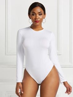 Features: Basic style Sheer: Opaque Stretch: Highly stretchy Material composition: 80% Polyester, 20% Spandex Care instructions: Machine wash cold. Tumble dry low. Model information: Regular size model-height 5'6.3", bust 35.1", waist 25.4", hip 41", size SProduct measurements:S: bust 30.4-34.3 in, waist 27.3-31 in, sleeve length 21.8 in, length 26.5 inM: bust 32-35.9 in, waist 28.9-33 in, sleeve length 22.2 in, length 27.3 inL: bust 33.5-37.4 in, waist 30.4-34 in, sleeve length 22.6 in, length 28.1 in Yoga Essentials, Lounge Dress, Basic Style, Long Sleeve Bodysuit, Stretchy Material, Jumpsuit Dress, Plus Size Outfits, Jumpsuit Romper, Casual Fashion