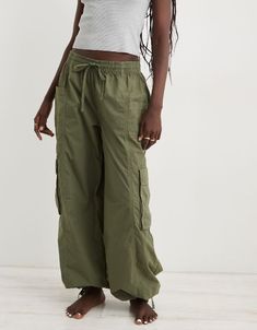 Cheap Fitted Wide Leg Parachute Pants, Loosely Fitted Straight Leg Cargo Parachute Pants, High Rise Relaxed Fit Parachute Pants With Pockets, Wide Leg Parachute Pants With Belt Loops For Outdoor, Loosely Fitted Parachute Pants With Cargo Pockets, High Rise Wide Leg Utility Pants With Cargo Pockets, High Rise Utility Wide Leg Pants With Cargo Pockets, Casual Wide Leg Cargo Skirt With Pockets, Casual Wide-leg Cargo Skirt With Pockets