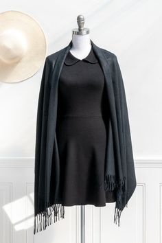 A must-have addition to your cold weather wardrobe, this simple-yet-chic scarf in a classic black cashmere feel will keep you cozy and stylish all season long. Please Note- This item is final sale only. . Details: 27" Wide x 71" Long 100% Polyester Imported French Girl Wardrobe, French Accessories, Chic Scarf, Chic Scarves, Romantic Dress, Girls Wardrobe, French Girl, French Fashion, White Plaid