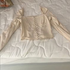 Long Sleeve Beige Blouse Never Worn! Super Cute With A Pair Of Jeans Or A Fitted Pant! Casual Long Sleeve Blouse For Going Out, Trendy Blouse For Going Out In Spring, Cropped Top For Going Out In Spring, Cream Tops For Spring Night Out, Spring Long Sleeve Tops For Going Out, Long Sleeve Tops For Going Out In Spring, Beige Cropped Blouse For Day Out, Beige Blouse For Spring Night Out, Beige Blouse For Night Out In Spring