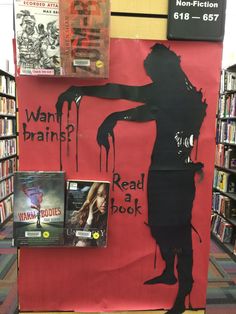 a display in a library with books and posters on it that say want brainwash? read a book