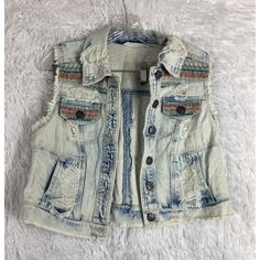 Vanilla Star Women Blue Acid Wash Denim Vest Size L Embroidered Nwt Please Feel Free To Ask Any Questions About This Item Or Please Make An Offer. We Combine Shipping. Fast Shipping! Next Business Day Shipping!!! Check Out My Closet Bohemian Denim Jacket With Frayed Hem, Spring Blue Denim Vest With Frayed Hem, Blue Denim Vest With Frayed Hem For Spring, Blue Denim Vest With Frayed Hem For Fall, Casual Embroidered Denim Vest For Spring, Bohemian Distressed Denim Outerwear, Bohemian Distressed Denim Jacket, Spring Bohemian Distressed Outerwear, Summer Embroidered Blue Denim Vest