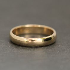 This 14k yellow gold heavy ring is a classic piece perfect for any jewelry collector! Worn with multiple bands it gives some great depth and also makes for a perfect wedding ring! ⊹ Vintage 14K Yellow gold⊹ Stamp reads 14K⊹ Excellent vintage pre-owned condition⊹ Ring Size: 7.5⊹ Width: 3.9mm Perfect Wedding Ring, Wedding Ring Vintage, Stacking Ring, Ring Vintage, Gift Accessories, Bracelets And Charms, Ring Size 7, Pendant Earrings, Stacking Rings