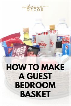 a basket filled with food and drinks on top of a white table next to the words how to make a guest bedroom basket