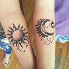 two people with matching tattoos on their legs, both have sun and moon tattoo designs