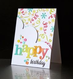 a happy birthday card on a table