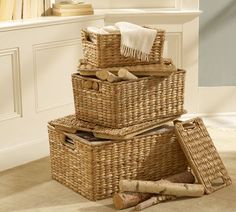 three wicker baskets stacked on top of each other