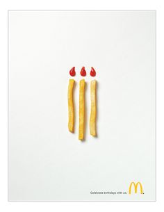 two pieces of fruit are arranged in the shape of mcdonald's fries