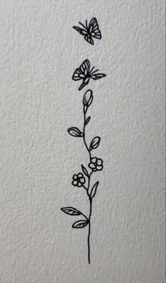 a black and white drawing of two butterflies on a flower