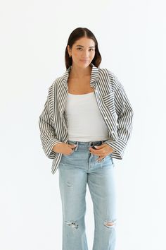 Stay cool and stylish this summer with our Zuma Button Down, featuring pretty iridescent buttons and a raw hem. This super lightweight top offers an effortless, relaxed, and roomy fit, making it perfect for warm weather. Best of all? Its 100% cotton! Wear it buttoned up for a polished look or unbuttoned over a swimsuit or tank for a breezy, casual vibe. This versatile piece is a must have summer staple! Malibu Collection FIT Relaxed Roomy Fit Iridescent Buttons High-Low Raw Hem Clancy is 5'9 Wea Jeans Material, Maternity Shops, Basic Dress, Lightweight Tops, Summer Staples, Denim Jean Jacket, Stay Cool, Jeans For Sale, Polished Look