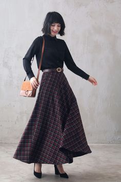 Elevate your style with our 40s Wool Maxi Plaid Skirt. Constructed with high-quality wool, this skirt offers maximum comfort and durability. Its classic plaid pattern adds a touch of sophistication to any outfit. Perfect for any occasion, this skirt is a must-have for any fashion-forward woman. DETAIL * 30% wool, 30% fiber, 40% polyester* fully satiny liner* Two side pockets* Right zip closure* Pleated Circle skirt* Knee length skirt* Perfect for Winter, autumn* Lean More about the items From the FAQs on the page bottom SIZE GUIDESize vary between Brand and CountryPlease get your body measurement with our Size GuideAnd Find your size in our Size Chart Choose CUSTOM Order if youCan't find your size in our size ChartChange the LengthChange the sleeve LengthYour Height is not Between 5'1" - 5 Wool Circle Skirt, Patterned Maxi Skirt, Plaid Maxi Skirt Outfit, Long Plaid Skirt Outfit, Plaid Pleated Skirt Outfit, Knee Length Skirt Outfit, Long Pleated Skirt Outfit, Knee Length Skirts Outfits, Ghost Shoot