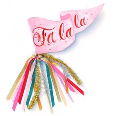 there is a pink toothbrush with the word fala la on it and streamers