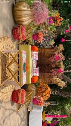 an arrangement of flowers and decorations on display