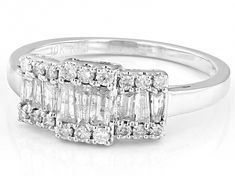 0.55ctw baguette and round white diamond, rhodium over 10k white gold ring. Measures approximately 1/2''L x 1/4"W and is sizeable. Silver Cluster Diamond Ring With Baguette Diamonds, White Gold Rings, White Diamond, Gold Rings, White Gold, Gold