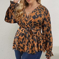 This fashionable Plus Size Leopard Brown Long Sleeve Peplum Wrap Top is the perfect addition to any wardrobe. The lightweight fabric and slim fit design are flattering for any body type, while the leopard pattern gives off a unique, trendy style. It's a must-have for any modern woman. 100% Polyester Imported Pull On closure Machine Wash Brand Size Dress Bust Waist Hip XS 0-2 31-32.5'' 23-24'' 31-34" S 4--6 33-35'' 25-26'' 35-37" M 8--10 35-36'' 27-28'' 38-39" L 12--14 38-40'' 29-31'' 40-42" XL 1 Peplum Wrap Top, Winter Knit Hats, The Leopard, Plus Size Black, Boot Accessories, Trendy Style, Leopard Pattern, Winter Knits, Wrap Top