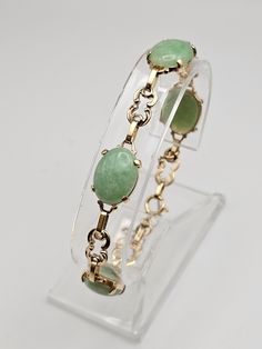 Vintage Ornate 14k Yellow Gold Jade Panel Bracelet  Item w #1438 - Clean and in good condition  - Marked 14k - 7.25 inches long with a spring ring clasp - Safety chain - Each Jade is approx 15mm Long and 12mm Wide -13.8 grams Welcome to Westgate Jewels!! We specialize in vintage estate, designer, and fine jewelry. Our shop consists of items that are estate, antique, and / or vintage conditions unless otherwise noted. This means that most items are prior owned and may have some imperfections such 14kt Gold Jewelry, Vintage Native American Jewelry, Bethlehem Pa, Vintage Designer Jewelry, Vintage Silver Rings, Everyday Bracelet, Green Jewelry, Safety Chain, Classy Jewelry