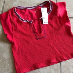 Urban Outfitters Go For Gold Berry Red (More Pink Than Red. Price Firm. Nwt. Perfect Condition. Sold Out Color That Hasn’t Been Restocked Since The Color First Came Out. Size Xl. Will Fit A Large Perfectly. Doesn’t Fit Me, I Thought If I Got The Biggest Size It Would Get Longer In Length But It Doesn’t Make A Difference Compared To My Xs/S Ones I Own. Priced Higher To To Make Back What I Spent Plus Tax/Shipping And Fees On Here And Because It’s A Sold Out Color. (Cheaper On Mer Car) Red V-neck Top From Urban Outfitters, Casual Purple Tops From Urban Outfitters, Red Urban Outfitters Crop Top, Urban Outfitters Purple V-neck Top, Urban Outfitters Shirt, Urban Baby, Olive Green Shirt, Cropped Button Down, Urban Outfitters Top