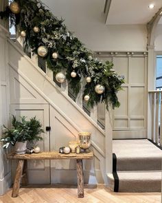 christmas decorations on the banister and stairs