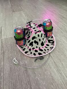 "**Be sure to check out my new website linked on my page or by going to www.howdy.company! A fun, neon style, cowboy hat with cup holders for two cans and a straw. Each hat is made to order to match your color preferences for both the Iights and the hat itself. The Iights give the hat a cool mix between futuristic and western looks. I love seeing all of the different color combinations people come up with. My personal favorites are the pink Iights with the pink hat or the aqua Iights with the wh Fun Cowboy Hats, Adjustable Fun Hat For Western-themed Events, Fun Mini Hats For Summer Rodeo, Fun Adjustable Mini Hats For Rodeo, Western Mini Hats For Summer Rodeo, Country Style Summer Costume Hats For Rodeo, Country Style Costume Hats And Headpieces For Summer Rodeo, Cowboy Hats Decorated, Birthday Cowgirl Hat