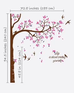 the tree with pink flowers and birds on it is shown in this wall decal