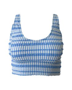 Stay covered, comfortable, and worry-free as you dive into any and all of your adventurous water activities. FITTrue to sizeSnug when dryMedium coverageMedium supportFEATURESBuilt-in bra with removable soft cupsFully lined with soft liningBand under bust for added supportAdjustable straps in back for a customizable fitLongline bra fit MIX & MATCHPairs great with the Gingham Mid Rise BottomSHOP MALIBU COLLECTION Water Activities, Gingham, Diving, Mid Rise, Bra, Water