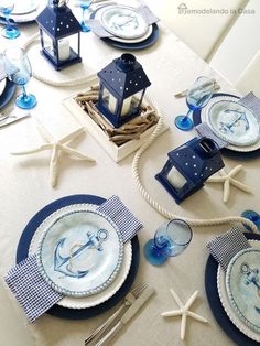 the table is set with blue and white dishes